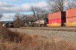 NS 4101 leads train 21M past a stopped train 18N